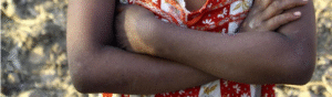 Folded arms of a female.